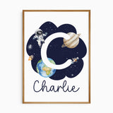 Personalised initial wall art with astronaut and planet for boys room