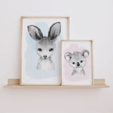 nursery wall art prints featuring a baby kangaroo and koala in soft watercolour style on blue and pink backgrounds