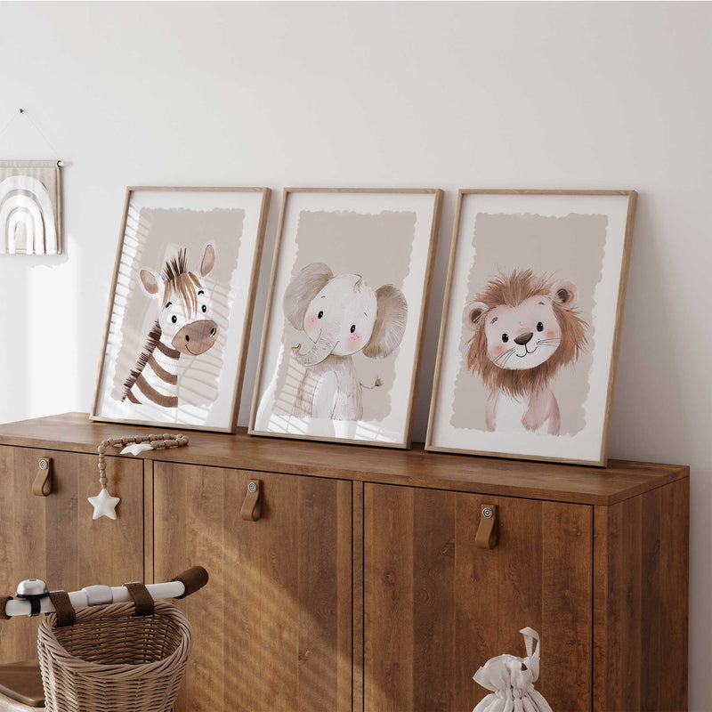 Baby animal nursery prints set with a lion, zebra and elephant in a soft neutral colour palette.
