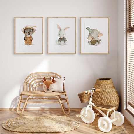 Baby animal nursery wall art set featuring koala, bunny and elephant prints in soft earthy tones for nursery decor