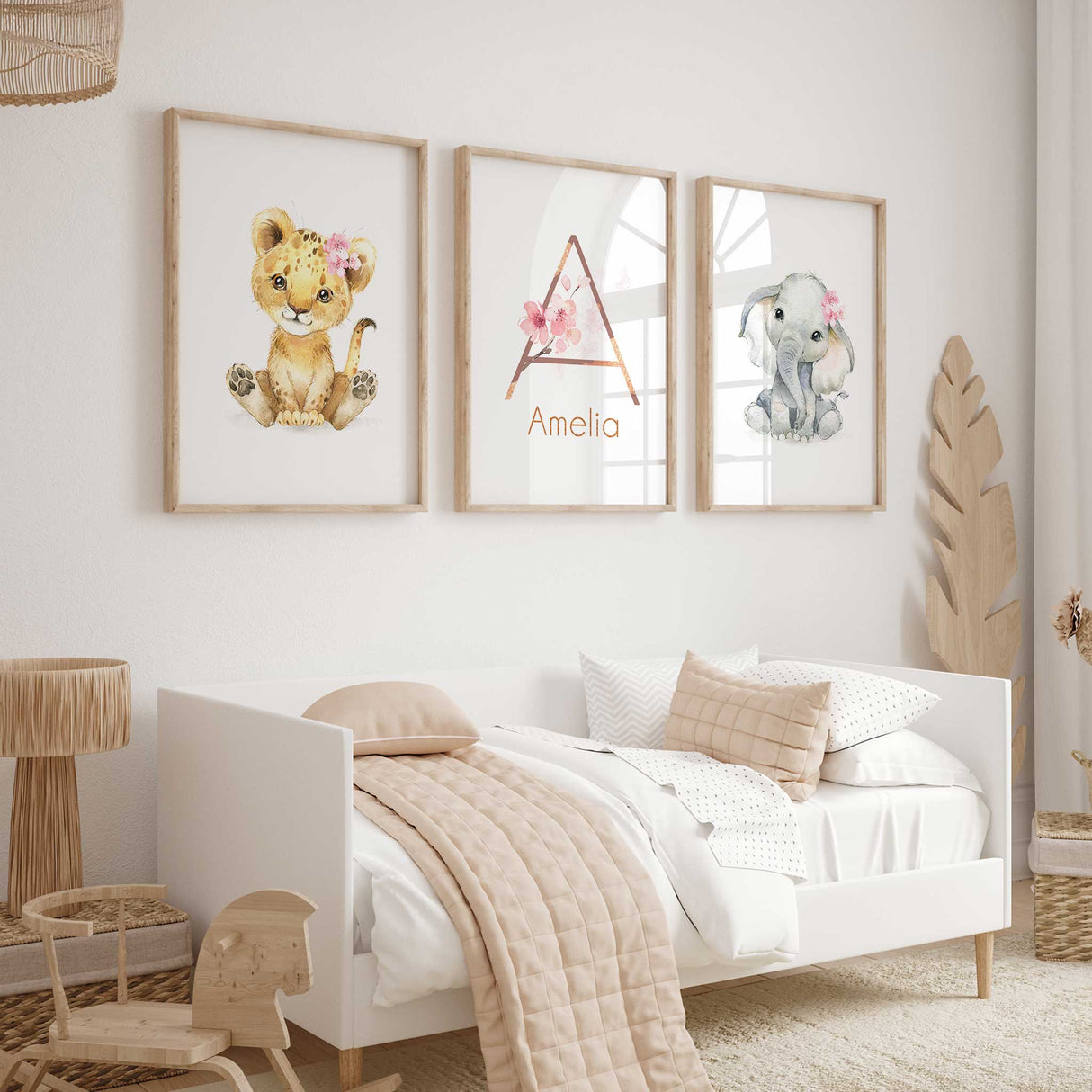 Baby girl safari wall art set with soft animal illustrations and personalised name print