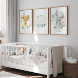 Baby lion and elephant nursery wall art with eucalyptus greenery and personalised name print