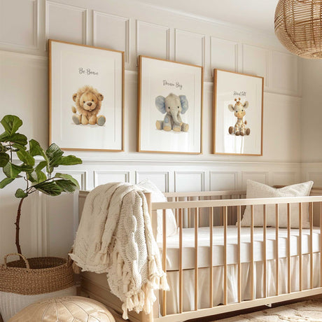 Plush safari animal wall art set in neutral tones with lion, elephant, and giraffe prints for modern nursery decor