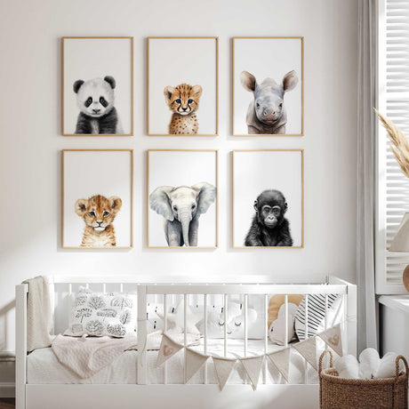 Baby room wall art featuring safari animals like zebra, lion, and rhino for a jungle-themed nursery.