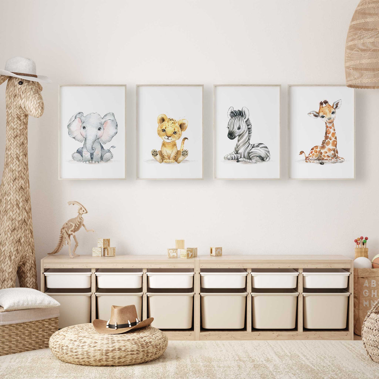 Baby safari animal wall art featuring soft watercolour elephant, lion cub, zebra and giraffe prints