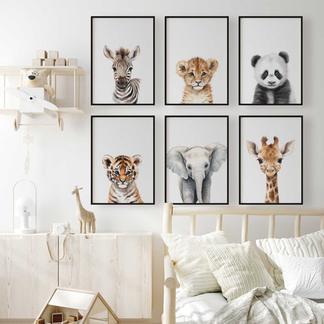 Baby safari animal nursery prints including zebra, lion, panda, tiger, elephant and giraffe in neutral tones for nursery wall decor