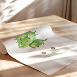 Green triceratops with pink cheeks above Be unique lettering and small footprint details on a white art print.
