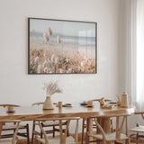 Beach grass photography wall print with soft coastal reeds and ocean scenery in a light neutral palette