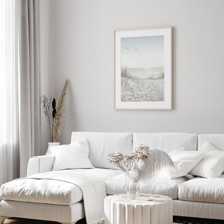 Minimalist beach photography print showing sandy dunes, gentle sea view and soft neutral tones for calm coastal home decor