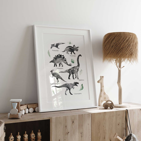 Black and charcoal grey dinosaur illustrations with six name labels and muted green leaves on a white background.