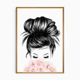 Black-and-white portrait of a woman with her hair in a bun, partly covered by soft pink flowers