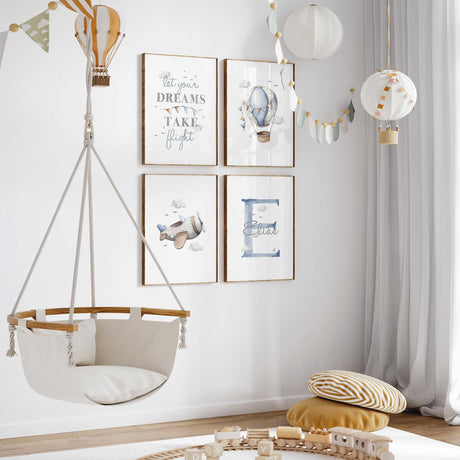 Blue aviation wall art featuring a watercolour hot air balloon, personalised initial and aeroplane for a child’s room