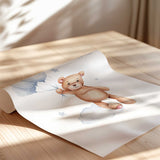 Watercolour teddy bear holding blue balloons among clouds and stars, boys nursery wall art print.