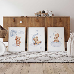 Watercolour teddy bear holding blue balloons among clouds and stars, boys nursery wall art print.