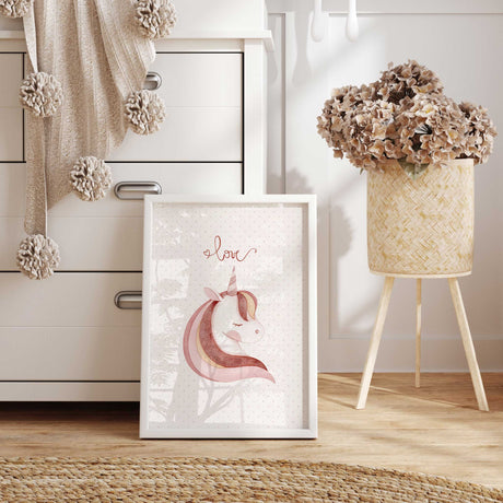 Blush pink unicorn kids wall art featuring a soft illustrated unicorn portrait with simple love lettering above