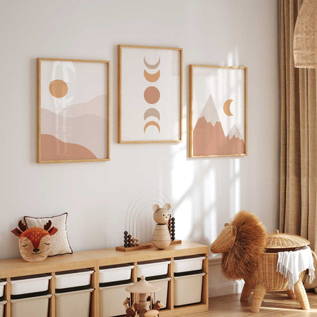 Set of 3 neutral boho kids wall art prints with sun, moon, and mountains