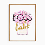 Boss Babe wall art featuring pink peonies in a perfume bottle with bold lettering and decorative gold glitter-effect accents.