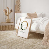 Botanical initial name print featuring eucalyptus leaves, gold accents and personalised child’s name.