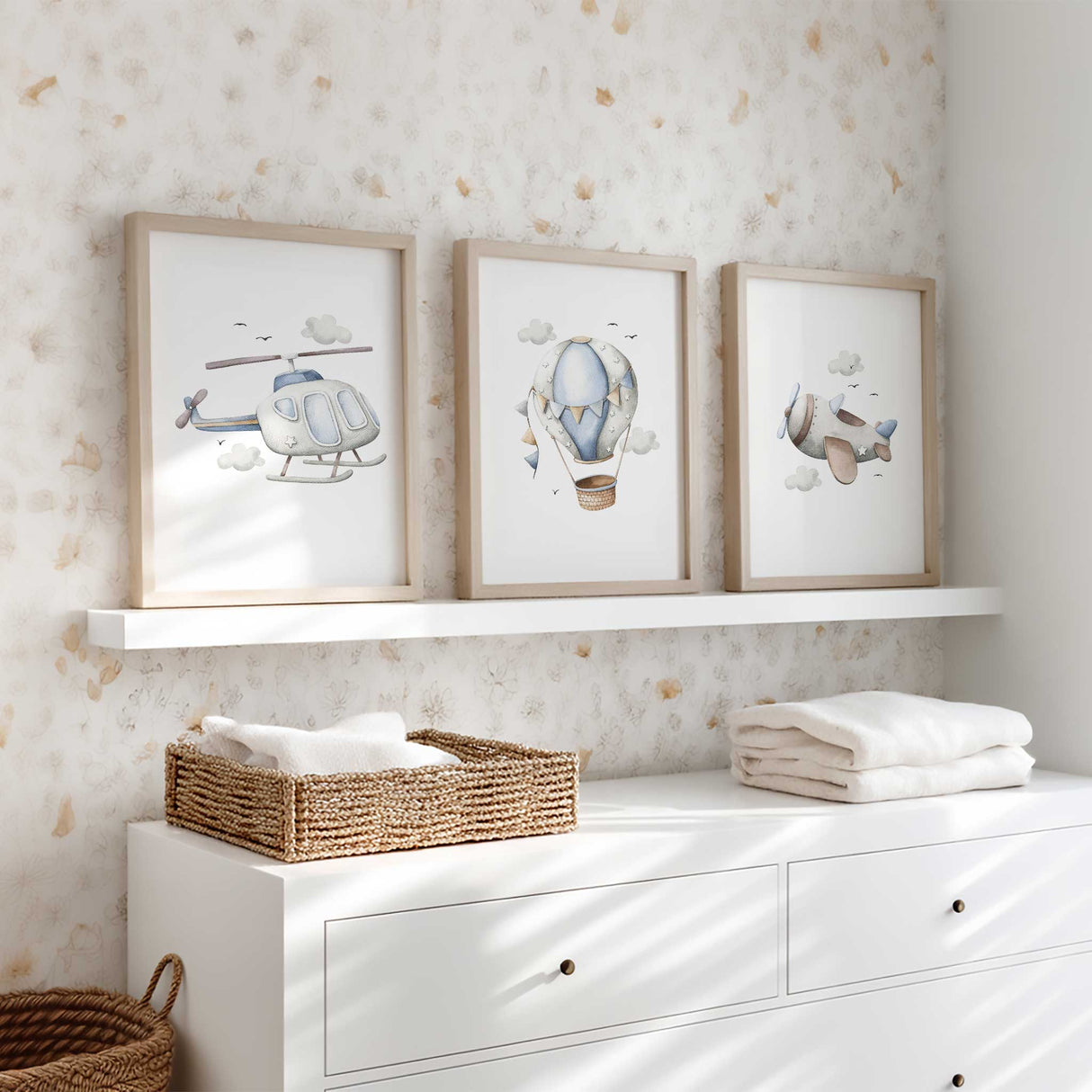 Boys aviation bedroom print set featuring an aeroplane, helicopter and hot air balloon in soft blue tones
