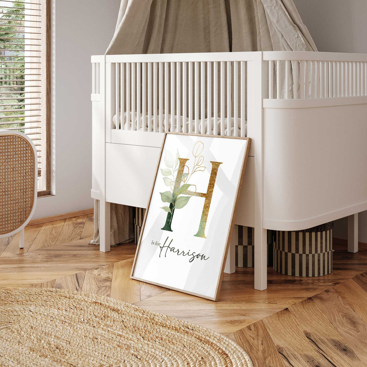 Personalised nursery wall art for boys or girls with green botanical foliage, gold initial and custom name.