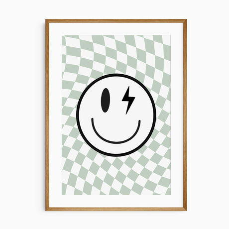 Boys smiley face wall art with lightning bolt eye and green checker background.