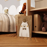 Cream polar bear illustration with mustard cheeks, a brown top hat and polka dot bow tie against a warm brown background.