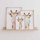 Giraffe nursery wall art print featuring a hand painted giraffe blowing bubblegum in soft neutral tones for modern nursery décor