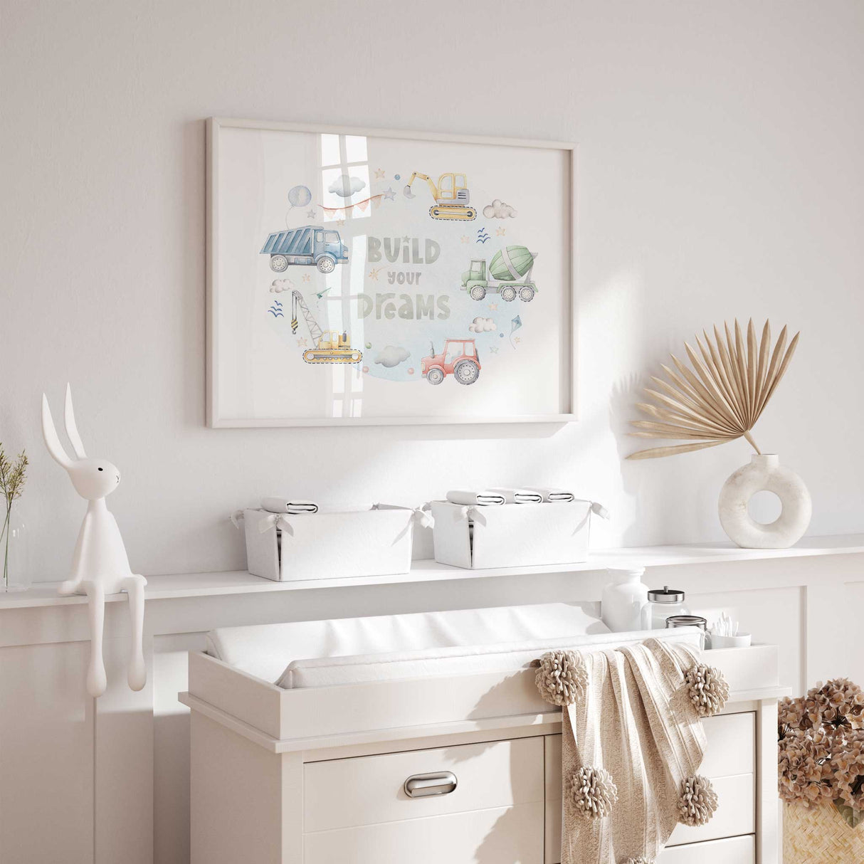 Inspirational nursery wall art with a blue dump truck, yellow excavator, green cement mixer truck, yellow crane, and red tractor, surrounded by playful elements.