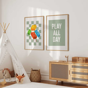 Kids playroom wall art set featuring colourful building blocks and a play all day quote on a sage green checkered background