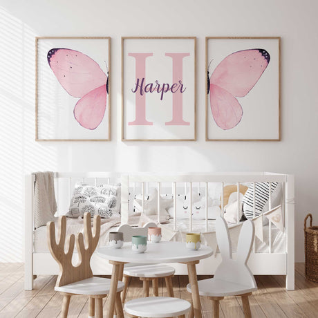 Pink butterfly wing nursery wall art with soft watercolour detail