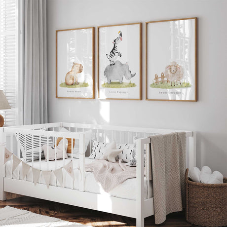 Capybara rhino zebra and sheep nursery prints in a soft neutral wall art set