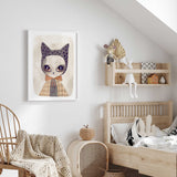 Charming cat print in a patterned outfit, perfect for girls room decor.