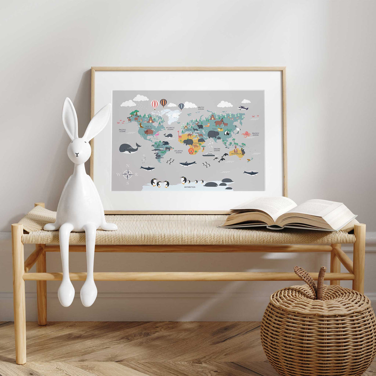 Kids' world map print with animals, hot air balloons, and ocean creatures in grey tones