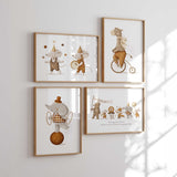 Neutral circus nursery wall art set of four prints with soft animal illustrations for modern nursery decor.