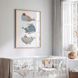 Coastal sea life wall art featuring whimsical whales for nursery decor