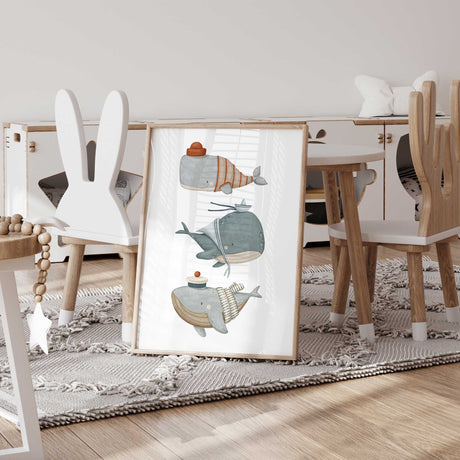 Nautical-themed whale prints for seaside-inspired nursery wall decor