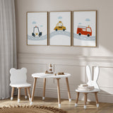 Three coordinating transport prints with blue clouds, a police car, yellow taxi and red fire engine on a curved road.