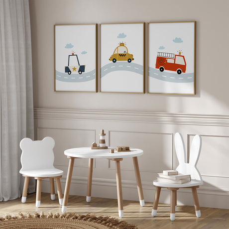 Three coordinating transport prints with blue clouds, a police car, yellow taxi and red fire engine on a curved road.