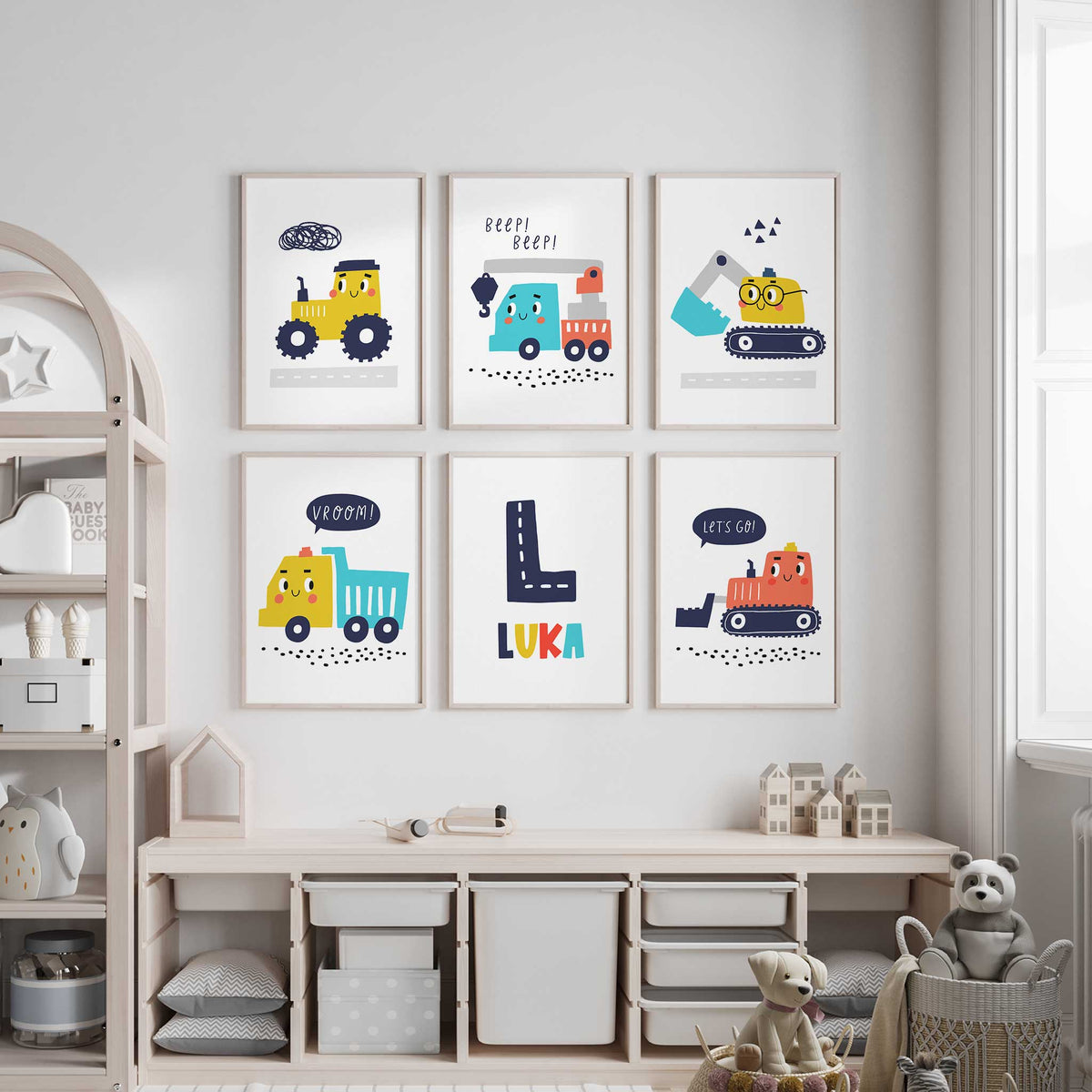 Six construction prints with a tractor, crane, digger, dump truck, bulldozer and personalised navy initial and name.