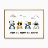 Four construction vehicles on blue, mustard and aqua rainbow arches above the words Dream It Believe It Build It.