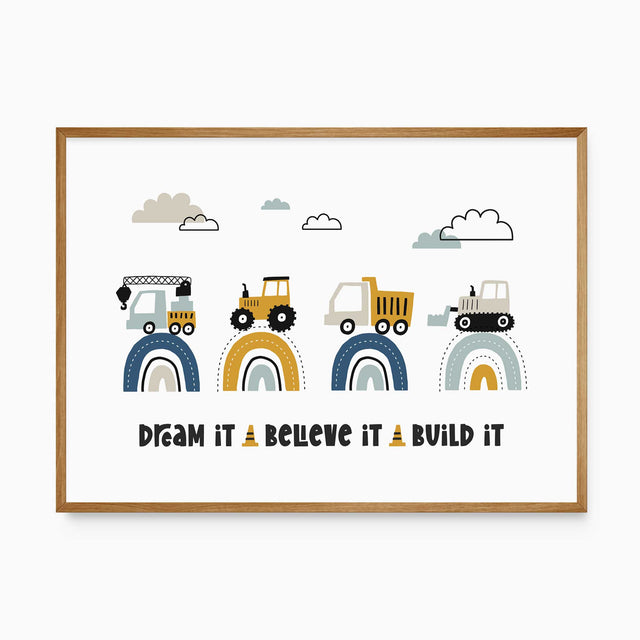 Four construction vehicles on blue, mustard and aqua rainbow arches above the words Dream It Believe It Build It.