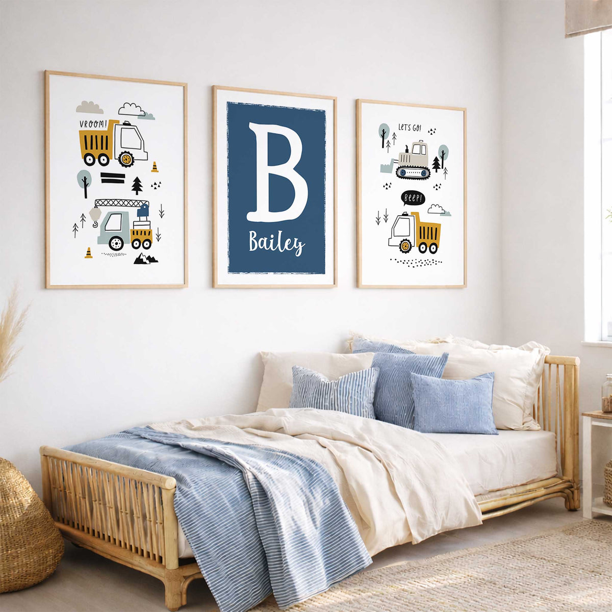 Construction truck wall art for boys bedroom with personalised initial and name print in matching nursery colours.