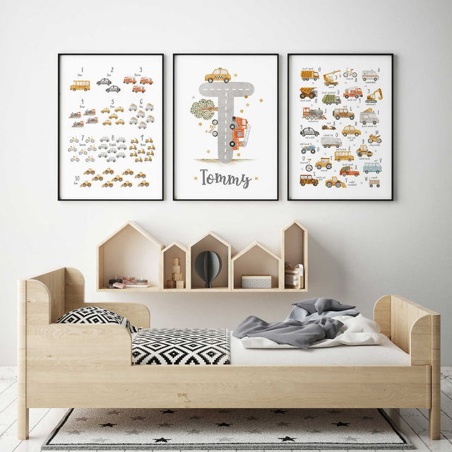 Construction wall art set of three with alphabet numbers and personalised name print styled in a kids bedroom