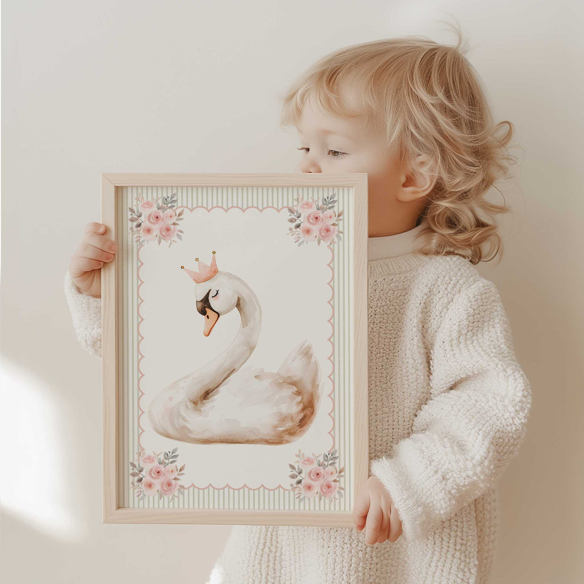 White swan with a blush crown, pink floral corners, a scalloped pink outline and a fine sage green striped border.