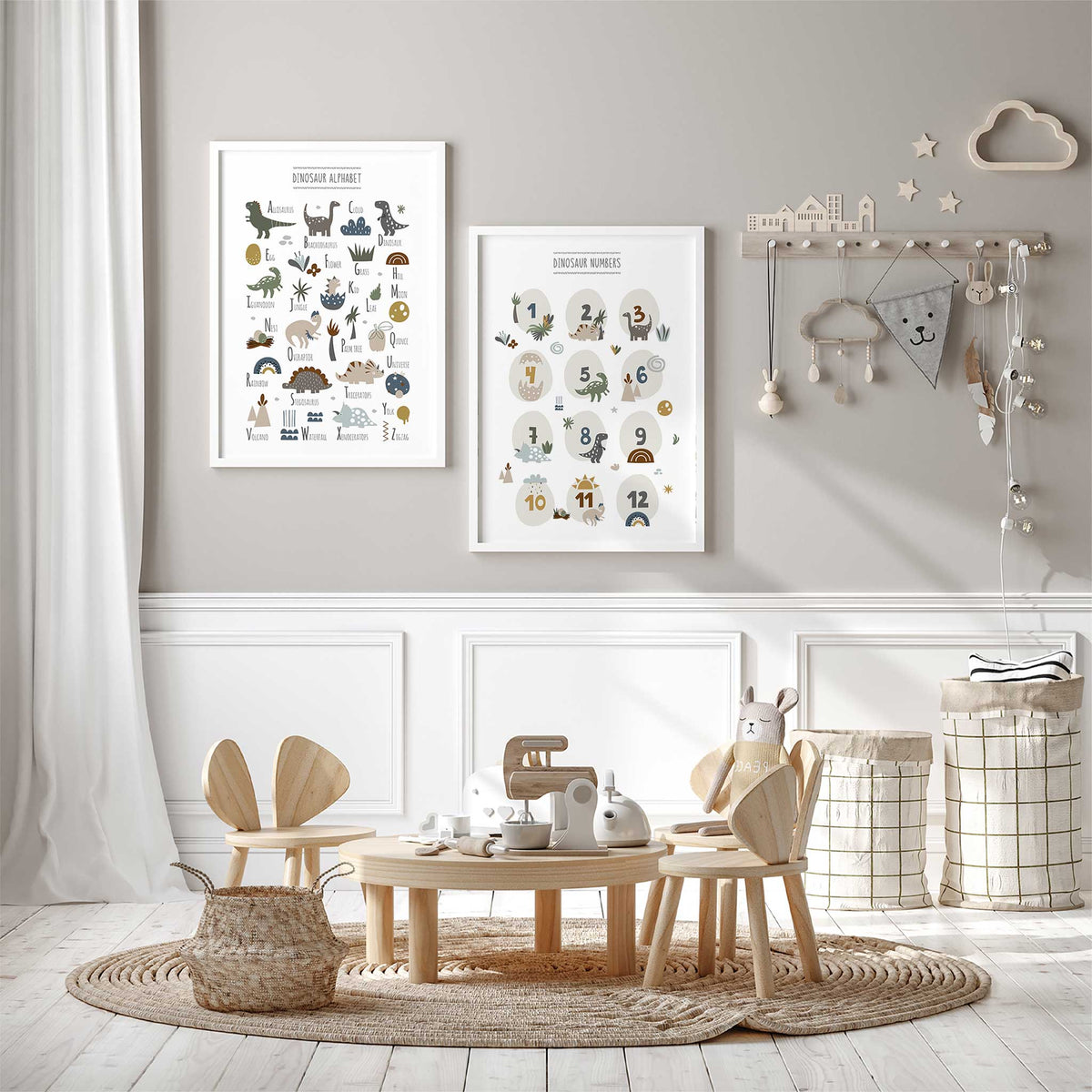 Two dinosaur prints showing an illustrated A–Z alphabet and numbers 1–12 in a matching earthy colour palette