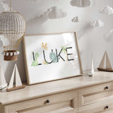 Personalised kids’ dinosaur print with a custom name and colourful dinosaurs and palm trees worked into the letters.