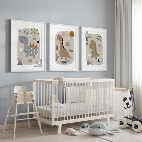 Dinosaur nursery wall art set featuring three cute dino prints in soft earthy tones with playful boho details for boys bedroom or nursery decor