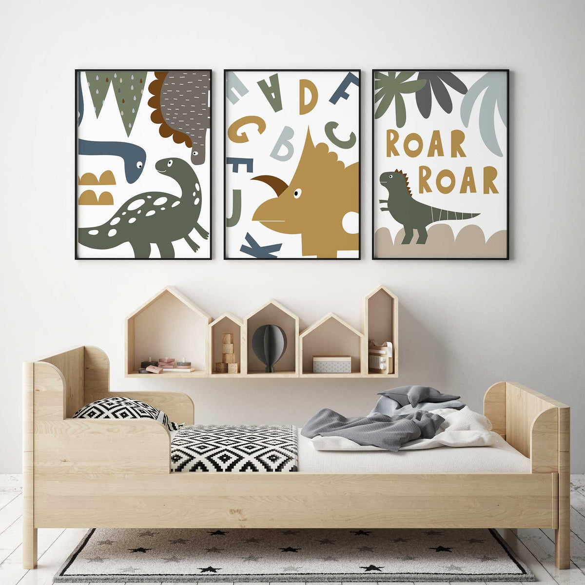 Set of three dinosaur prints featuring playful dinosaurs, alphabet letters and a bold Roar design in earthy colours