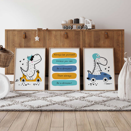 Three dinosaur prints showing a scooter-riding dinosaur, a dinosaur in a car and a colourful dinosaur quote