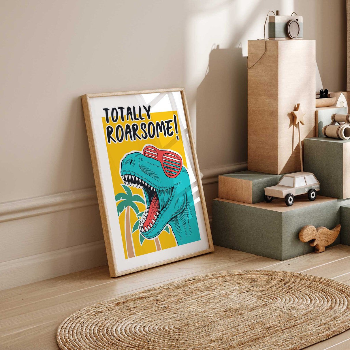 Dinosaur wall art featuring a turquoise T-rex in red sunglasses with Totally Roarsome lettering on yellow.